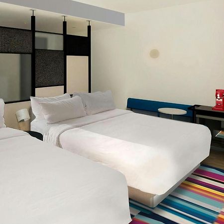 Отель Aloft Santo Domingo Piantini Экстерьер фото